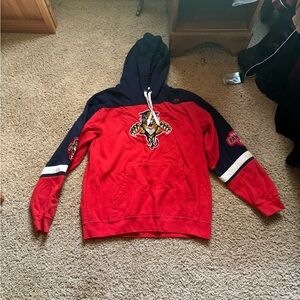 Majestic Brand Florida Panthers Hockey hooded sweatshirt. Red and blue. Medium.